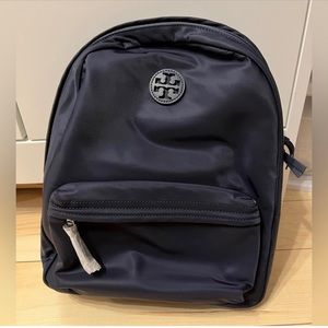Tory Burch Backpack 100% brandnew and Authentic 
Navy blue Nylon